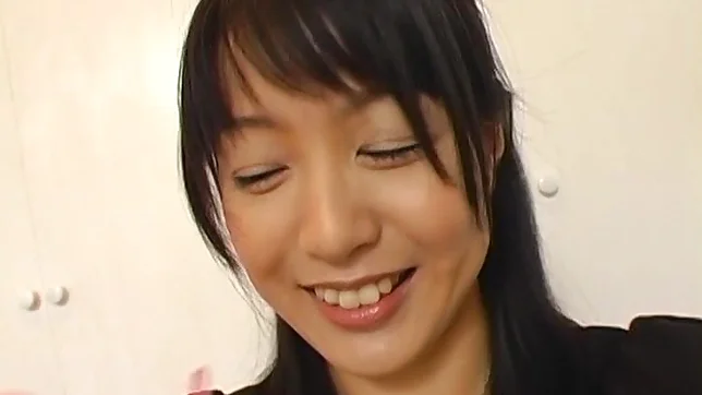 Nana Nanami plays with toys on her sweet pussy 2