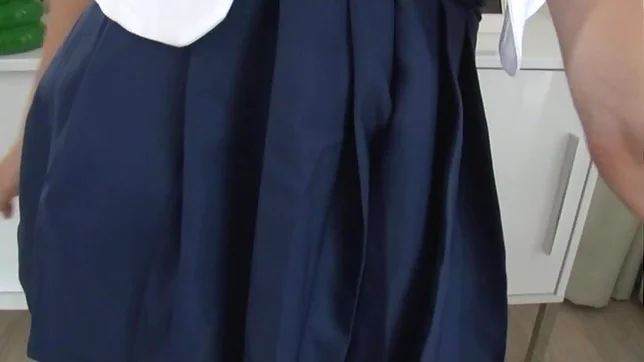 Schoolgirl with glasses gives a sensual striptease 2