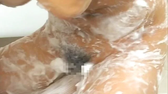 Moka Asian model plays with cock in the shower 4