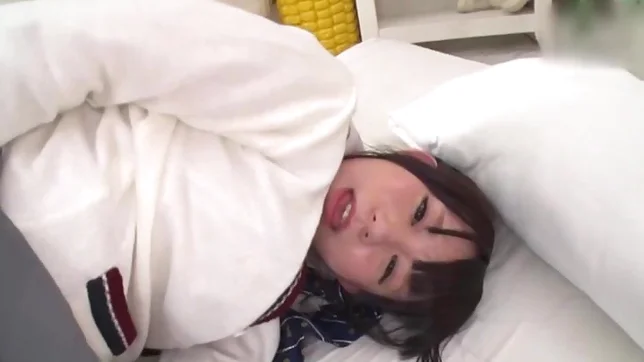 Talented Japanese teen Konishi Marie licks ass and gives a foot job 2