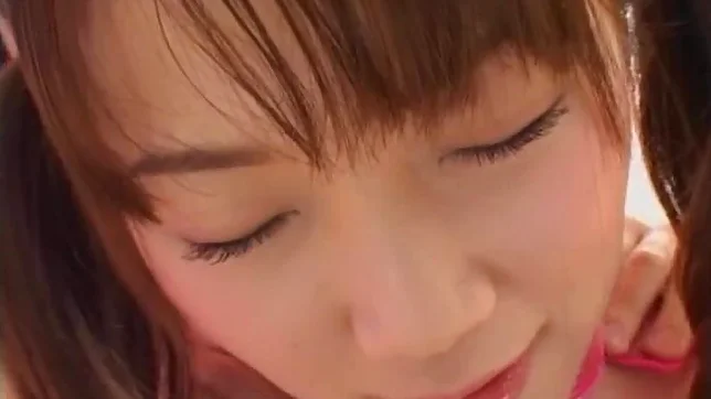Horny young Japanese AV Model with pigtails sucks two dicks 2