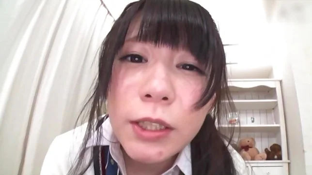 Talented Japanese teen Konishi Marie licks ass and gives a foot job 4